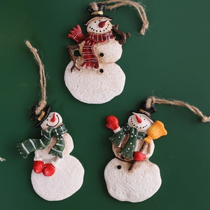 Three-piece resin snowman ornament set with festive red and green holiday decor