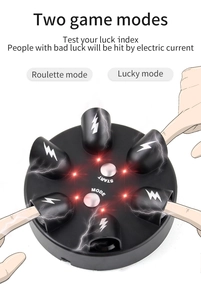 Macro detail of 6-finger electric lie detector toy with mode buttons and shock sensors