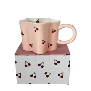 Pink ceramic cherry star mug with scalloped edge and matching gift box packaging