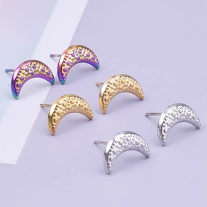 Macro shot of 304 stainless steel moon earrings in gold, silver, and purple finishes