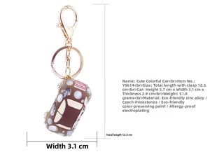 Detailed dimensions of the cute rhinestone car keychain with pink and white patterns