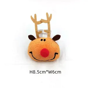 Detail of plush orange reindeer decoration with red nose, height 8.5cm and width 6cm