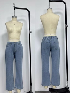 Detailed front and back view of light blue high-waist denim pants with pocket details