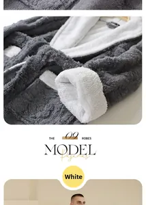 Close-up of thick flannel fabric texture and stitching on gray and white plush bathrobe