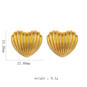 Detailed view of gold heart earrings with dimensions showing 24.20mm height and 27.89mm width