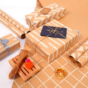 Brown kraft paper gift wrap set with polka dots, hemp rope, and thank you cards
