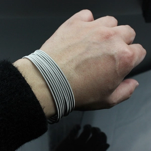 Minimalist 1.7mm stainless steel multi-strand wire bracelet with screw clasp closure