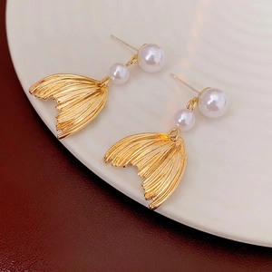 Elegant gold fishtail pearl drop earrings with textured metal and white imitation pearls