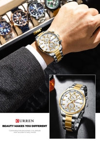 Detail of two-tone stainless steel chronograph watch with white dial and tachymeter bezel