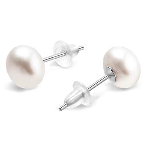 Macro shot of 925 sterling silver studs with round cream white freshwater pearls