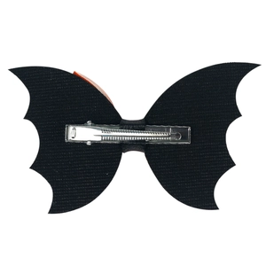 Detail view of the silver metal alligator clip on the back of the black bat hair clip