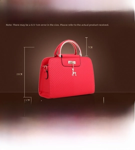 Detail showing the red embossed handbag dimensions 26x11x20cm and premium PU leather texture