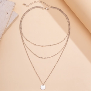 Three-layer silver necklace with minimalist round pendant and adjustable lobster clasp chain