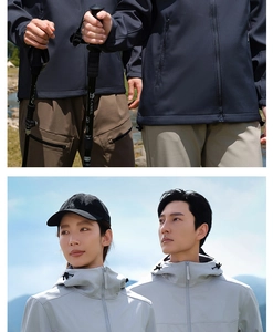 Close-up of windproof softshell jackets for outdoor hiking with hoods and zipper details