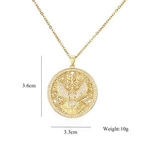 Detailed size view of gold eagle pendant with zircon stones showing 3.3cm diameter
