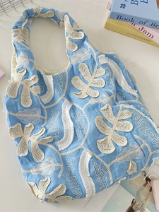 Lace flower light blue shoulder bag with floral embroidery and tassel details