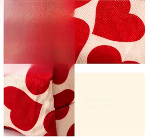 Macro detail of high-quality corduroy fabric and precise stitching on heart makeup bag