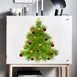 Christmas tree wall sticker with gold star and red baubles on a white cabinet