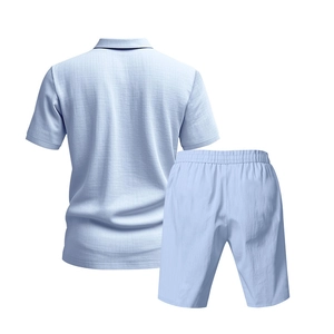 Rear view of light blue linen polo shirt and shorts set showing detailed fabric texture
