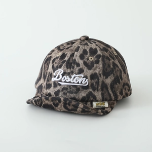 Detailed view of the leopard print baby baseball cap with white Boston embroidery