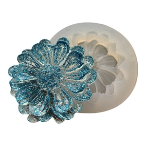 DIY silicone mold for daisy flowers with a blue glitter resin finished product display