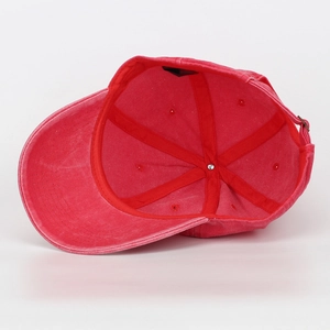 Inside view of a washed cotton baseball cap with adjustable strap and breathable fabric