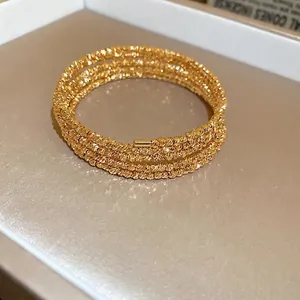 Elegant multi-layer gold plated wrap bracelet with sparkling textured beaded finish for women