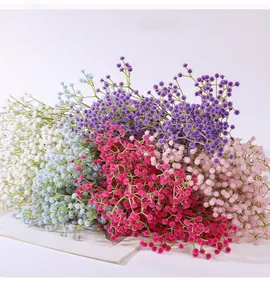 Detailed view of colorful artificial baby's breath flowers in white, blue, purple, and pink