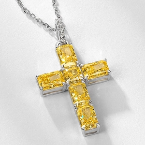 Hip hop S925 silver cross pendant featuring a radiant yellow stone and sparkling diamonds