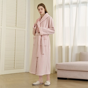 Thick pink plush long bathrobe for women featuring cream fleece collar and warm belted design