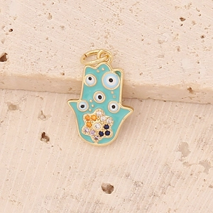 Gold Hamsa Hand pendant with turquoise enamel and colorful zircon evil eye accents