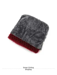 Close-up of thick grey and burgundy fleece lining for winter thermal knit hat