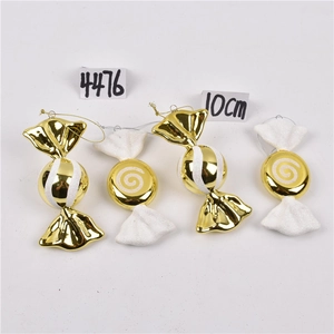 Macro shot of 10cm gold and white candy cane Christmas tree hanging ornaments set