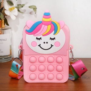 Detail of pink unicorn silicone pop-it shoulder bag for kids with adjustable strap