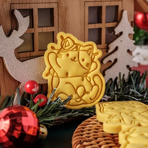 Cartoon Christmas cat cookie cutter molds featuring a cat with festive holiday lights