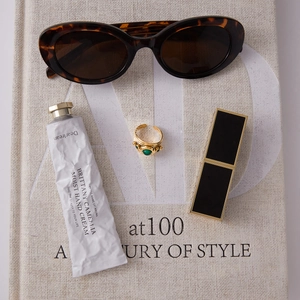Retro 18K gold stainless steel ring with green malachite stone in a lifestyle layout
