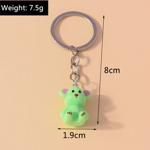 Detailed view of a 3D cute green bear keychain with size specs 8cm height and 7.5g weight
