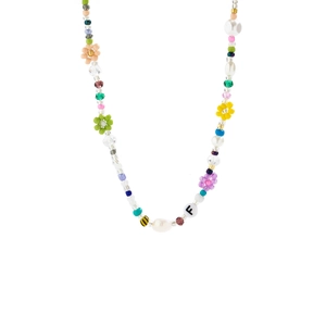 Macro shot of colorful beaded choker with acrylic flowers and a white pearl letter F bead