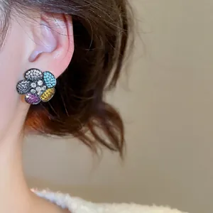 Elegant multi-color zircon flower stud earrings in vintage black gold finish
