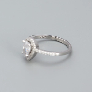 Elegant S925 sterling silver ring with a sparkling pear-shaped zircon and halo setting
