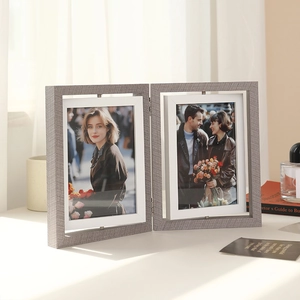 Rotating double-sided wooden photo frame with gray textured finish for home decor