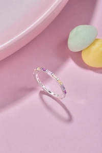 Detail of S925 sterling silver ring with colorful rectangular cut rainbow zircons
