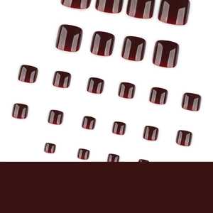 Glossy burgundy gradient press-on toenails set on a clean minimalist white background