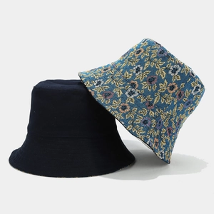 Ethnic reversible bucket hat for women with floral jacquard pattern and navy cotton fabric