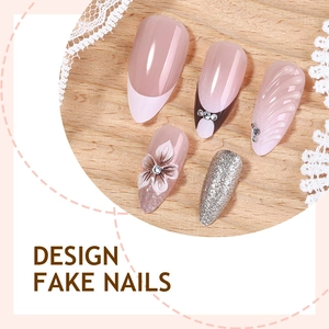 3D almond press-on nails with nude pink floral design, rhinestones and silver glitter