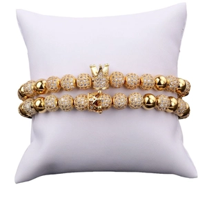 Luxury gold beaded bracelet set with crown pendant and micro-paved zircon stones