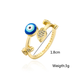 Detail view of gold-plated evil eye ring with 1.8cm diameter and 3g weight