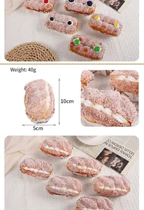 Detailed close-up of realistic PU cream bread model showing size 10cm x 5cm and 40g weight