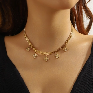 Gold-plated woven stainless steel necklace featuring five diamond-set four-leaf clover charms