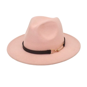 Detail of pink fedora hat with a black leather belt strap and golden metal buckle